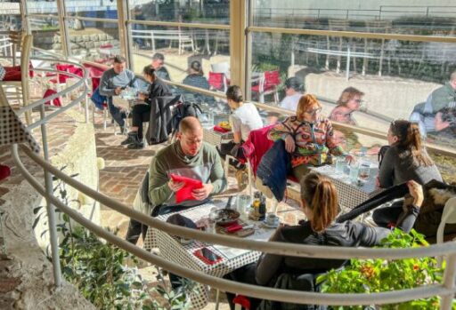 people eating food in a restaurant in kotor